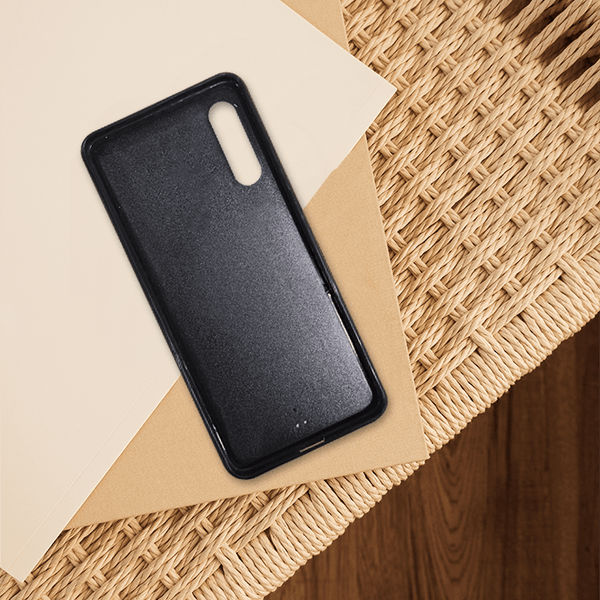 Dealer de Coque - Coque personnalisable noire en silicone pour Samsung A, protection antichoc, design unique et impression haute définition, compatible Samsung Galaxy A. Focus sur la matière.